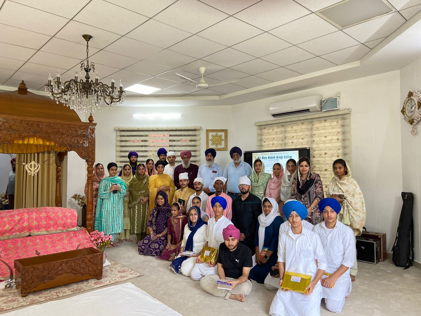 Shabad Gayan competition — students perform in the devotional music event.